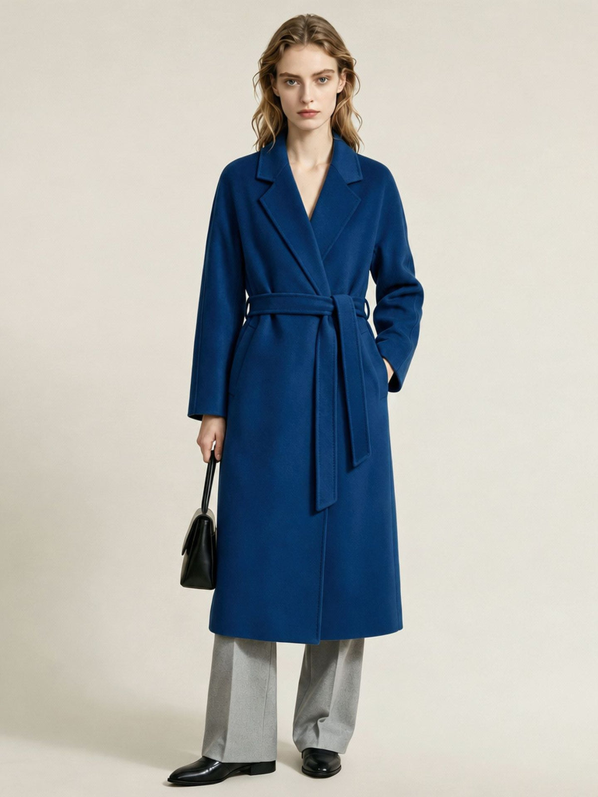 Cobalt blue double-breasted wool cashmere coat with tie-waist belt and lapels