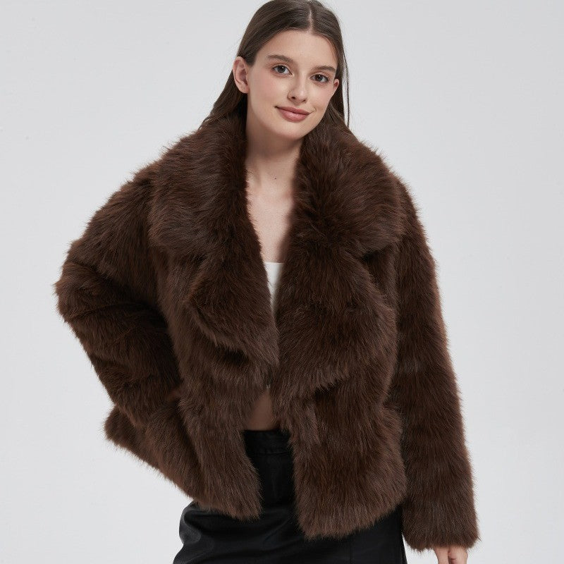 Brown faux fur short coat close-up with plush texture and oversized collar