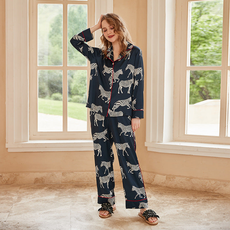 Navy zebra-print pajama set with button-front long sleeves and relaxed-fit pants