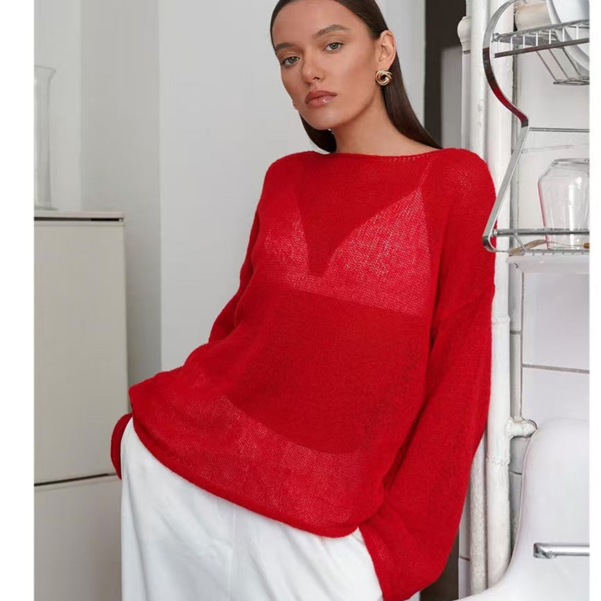 Red women’s loose knit sweater top with round neck and long sleeves, relaxed fit