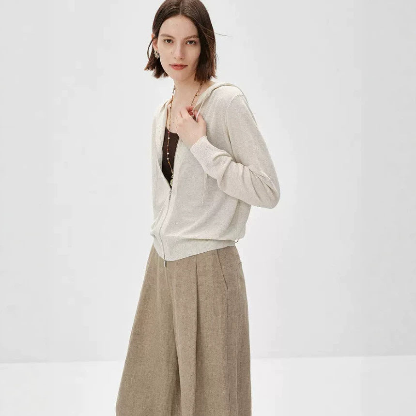 Light beige knit cardigan with V-neck zipper front, side view