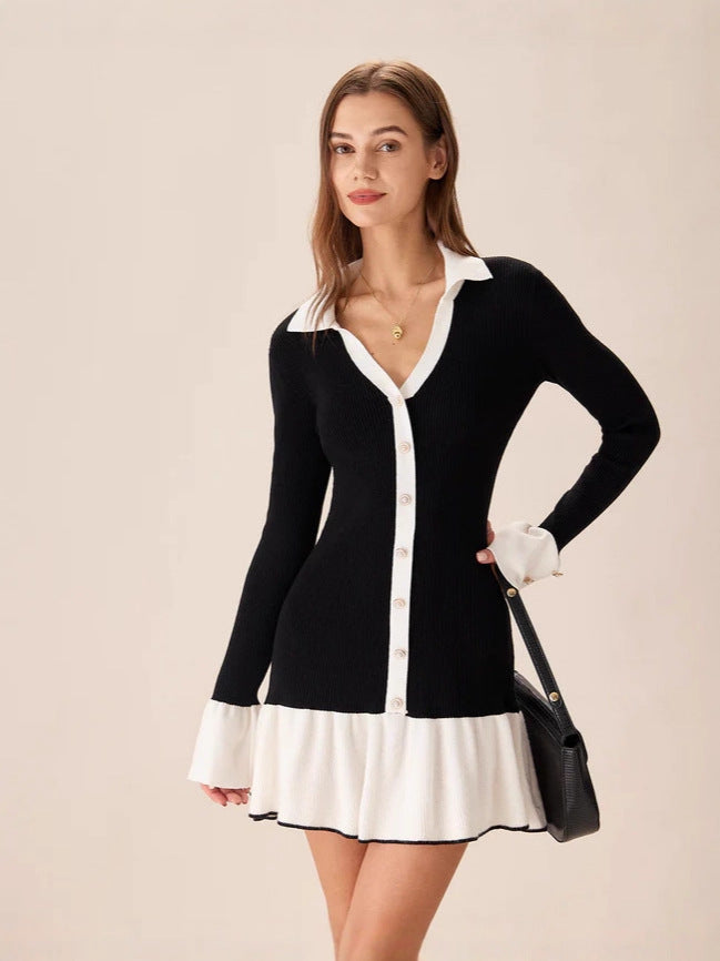 Black and white collared knit mini dress with long sleeves, button placket, ruffle hem