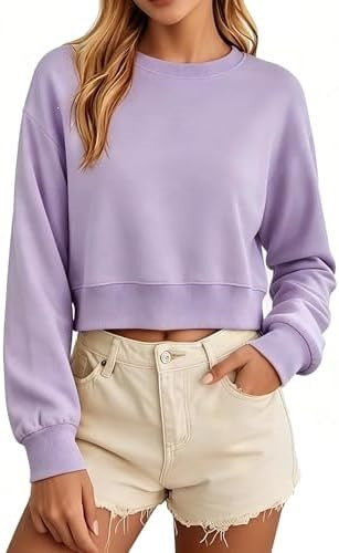 Light purple cropped sweatshirt with a crew neck, loose long sleeves, and ribbed cuffs