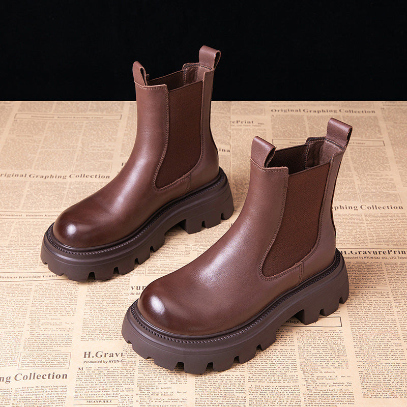 Brown chunky Chelsea boots with elastic side gore and thick tread platform sole