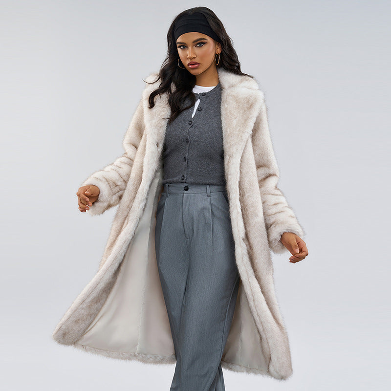 Off-white faux fur long coat with pointed collar, button front, and side pockets