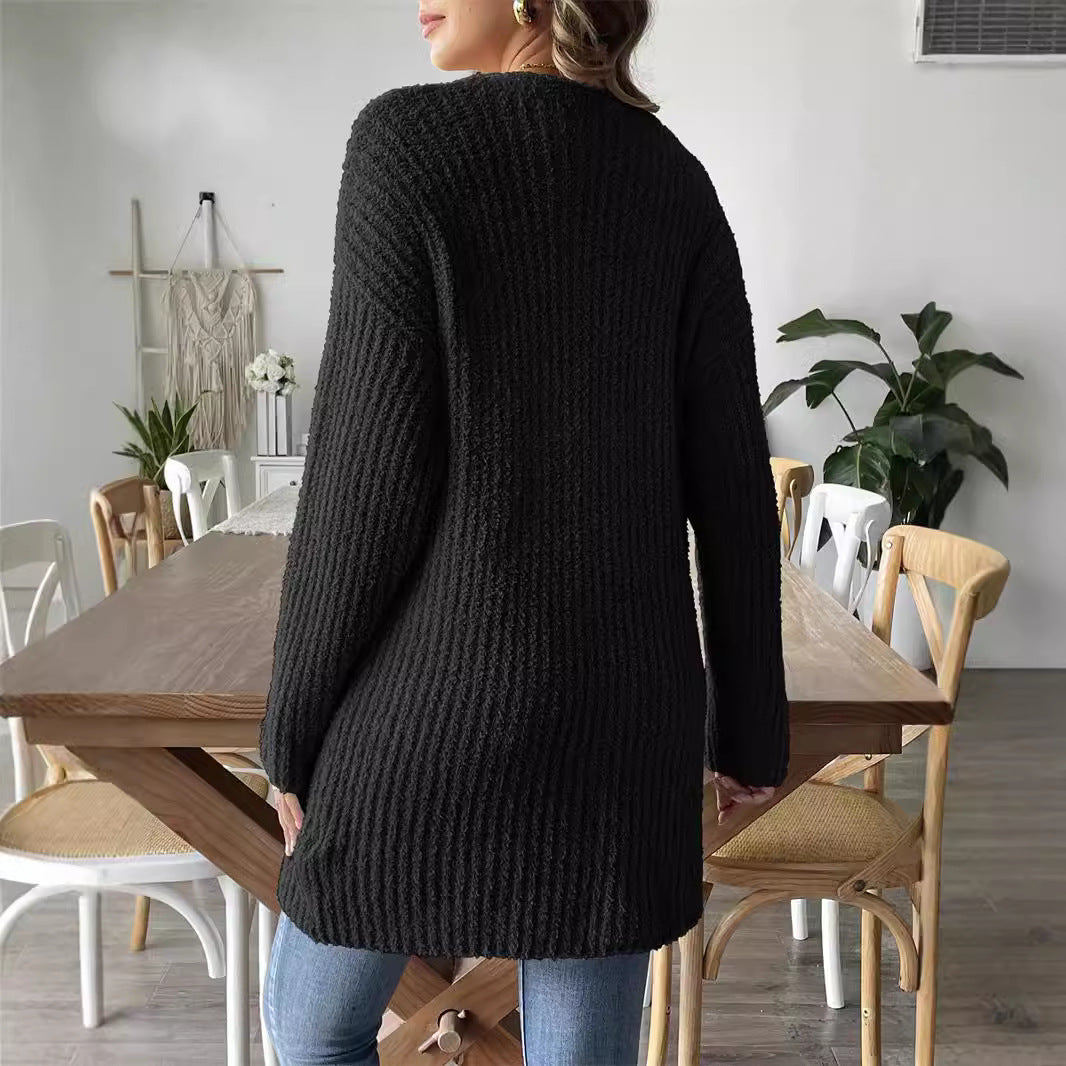 Women's black knit cardigan sweater, open front, long sleeves, textured straight hem