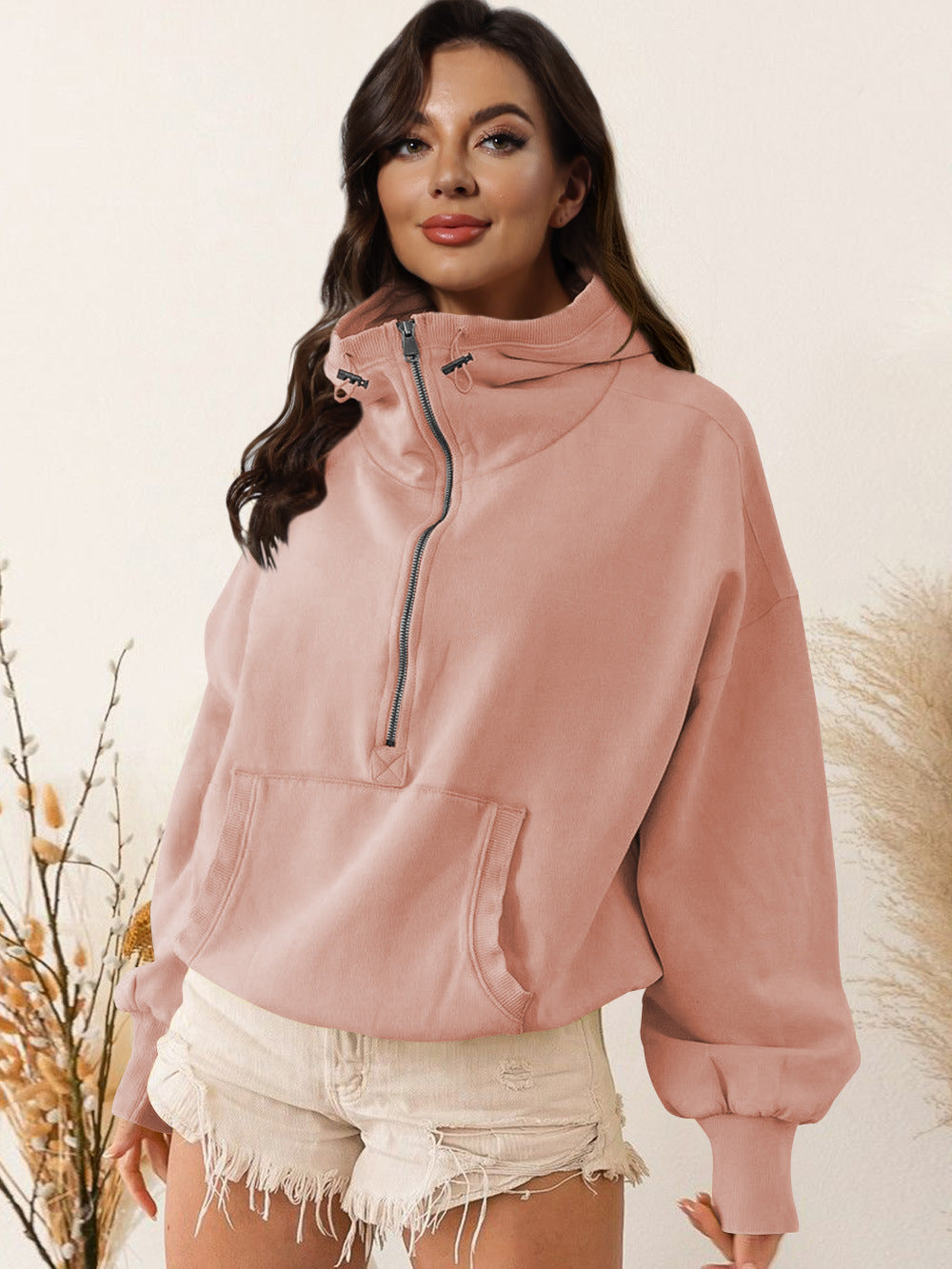 Pink hooded zip sweatshirt with drawstring and front kangaroo pocket