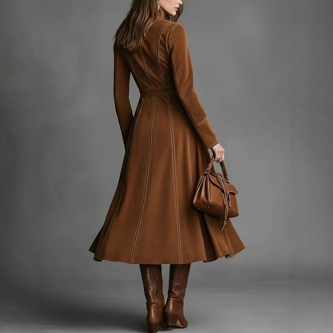 Camel stand-collar long-sleeve dress with drawstring waist, pockets, and flared skirt.
