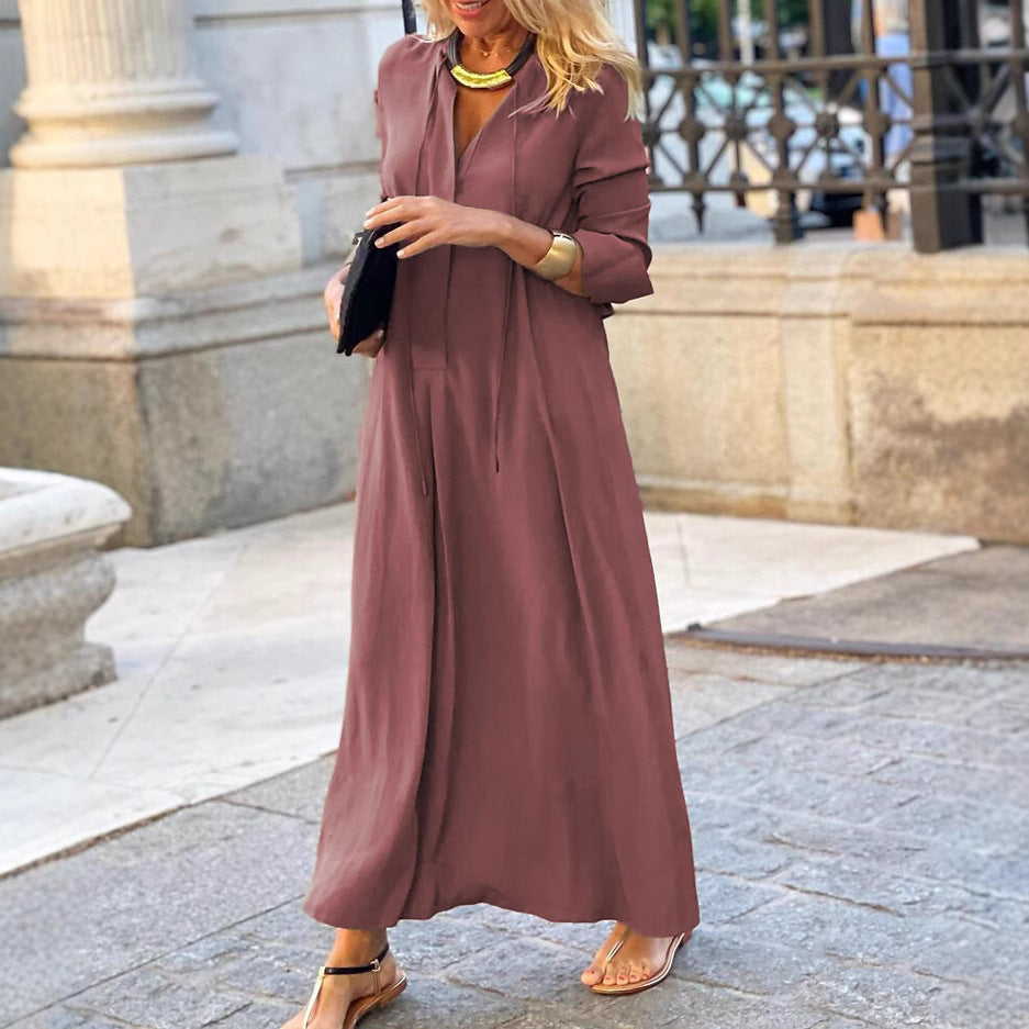Muted rose linen maxi dress with long sleeves, V-neck and flowing skirt