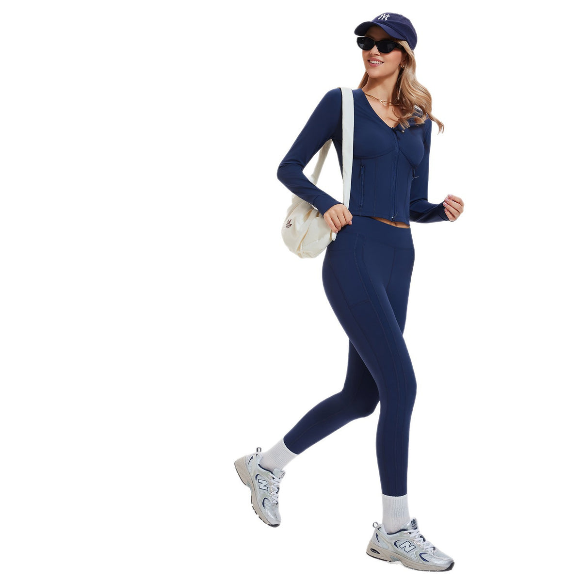 Navy yoga set with a cropped zip jacket and matching leggings