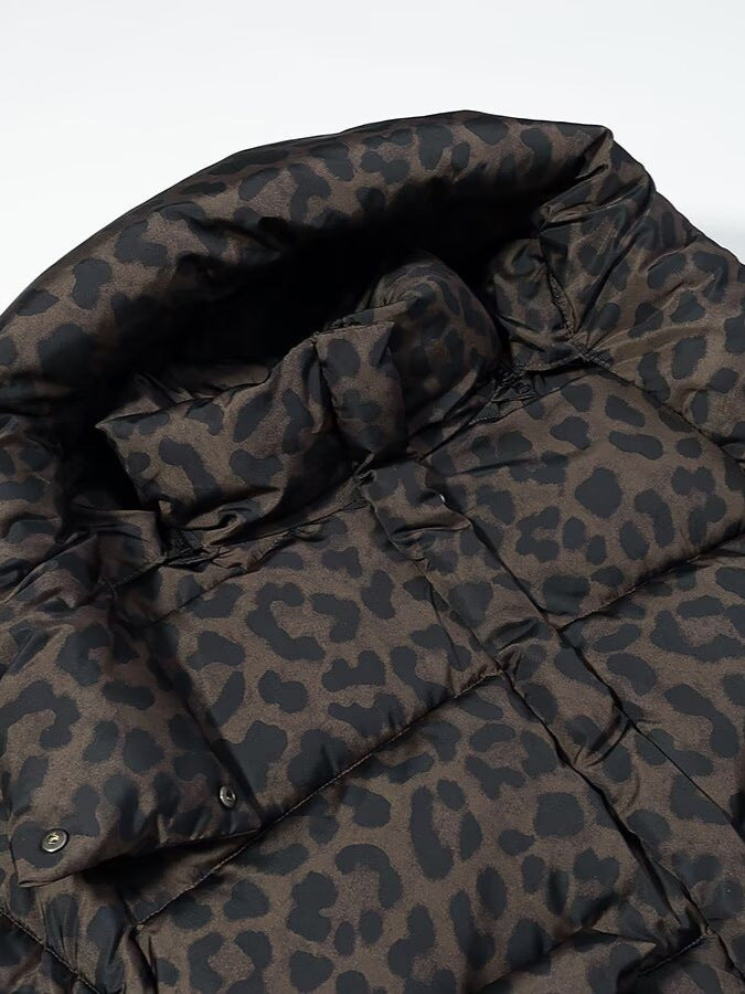 Leopard print hooded puffer jacket fabric close-up with gathered hood