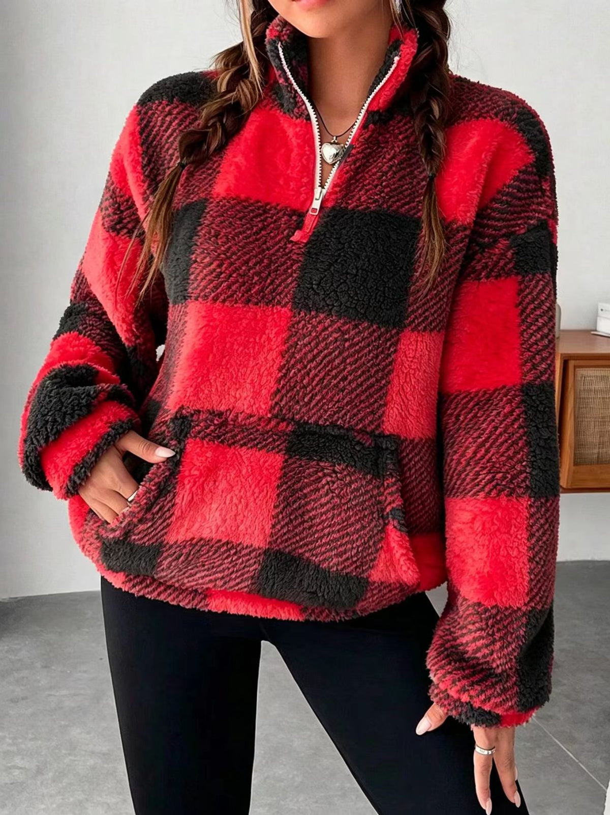 Women’s plaid plush quarter-zip sweatshirt, red and black, half-open collar