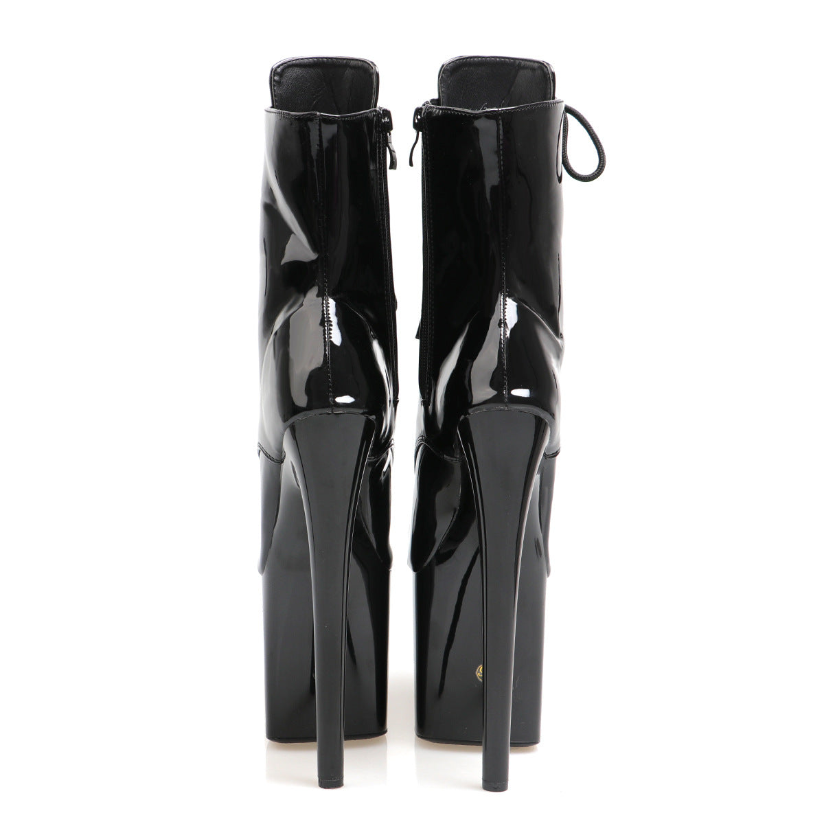Black glossy ankle boots with back zipper, lace details, and high stiletto heels