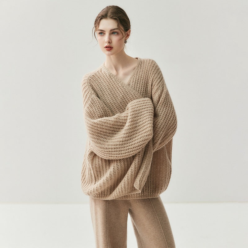 Tan loose knitted cardigan with V-neck style and wide draped sleeves