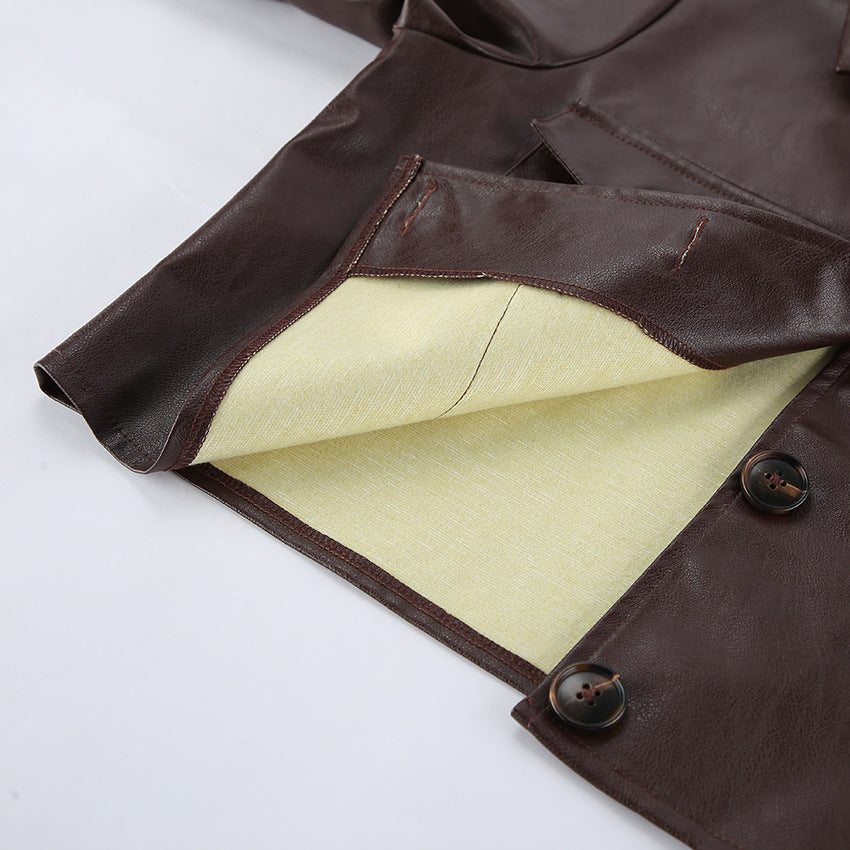 Brown leather jacket sleeve lining detail with quilted inner fabric and buttons
