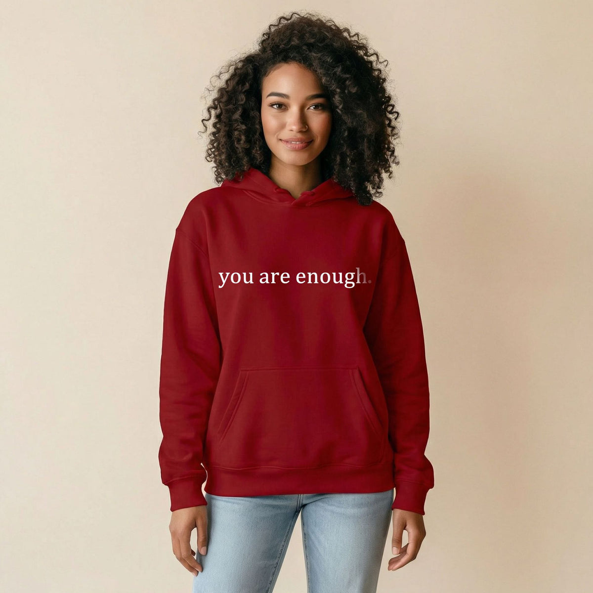 Wine red women’s hoodie sweatshirt with hood, front pocket, and 'you are enough' print.