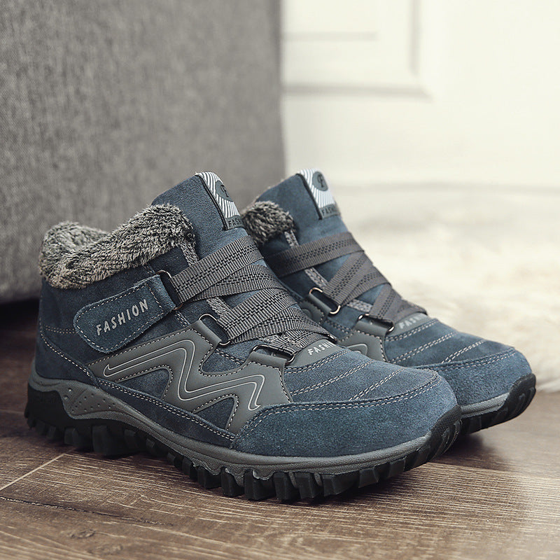 Blue winter snow boots with faux fur collar, hook-and-loop straps, and rugged tread