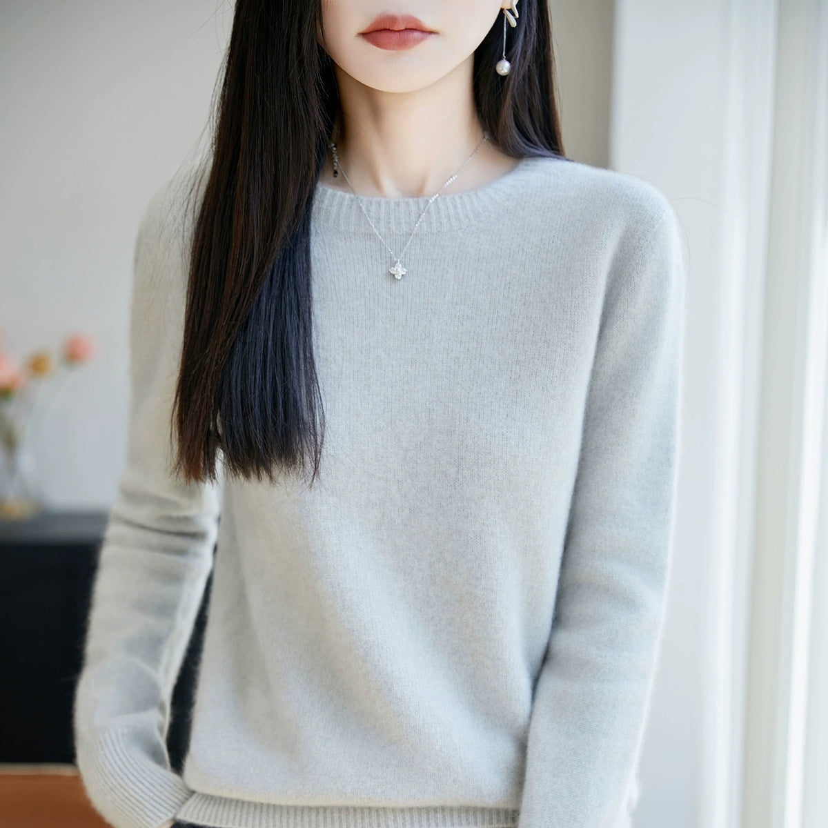 Women’s cashmere crewneck sweater, light gray, relaxed fit knit with ribbed cuffs and hem