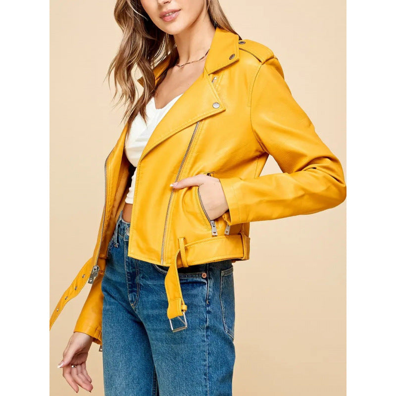 Women's short PU leather jacket in bright yellow, zip-front biker style with belt tabs