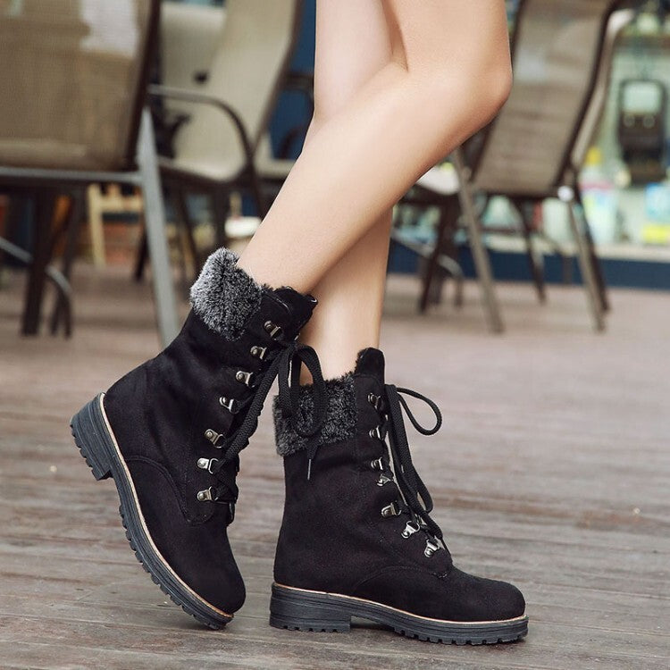 Black suede lace-up winter boots with faux fur trim and lace-up front
