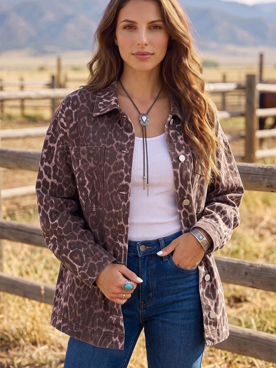 Leopard print denim jacket with turn-down collar, button front, long sleeves, chest pockets