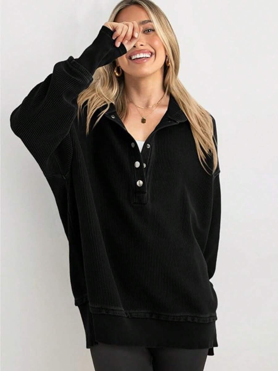 Black hooded henley sweatshirt with button placket and loose raglan sleeves