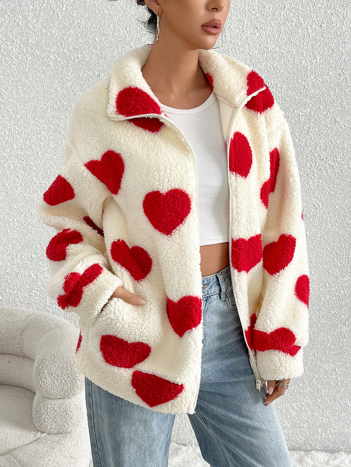 Cream plush zip-up cardigan with red heart print, long sleeves, full front zipper