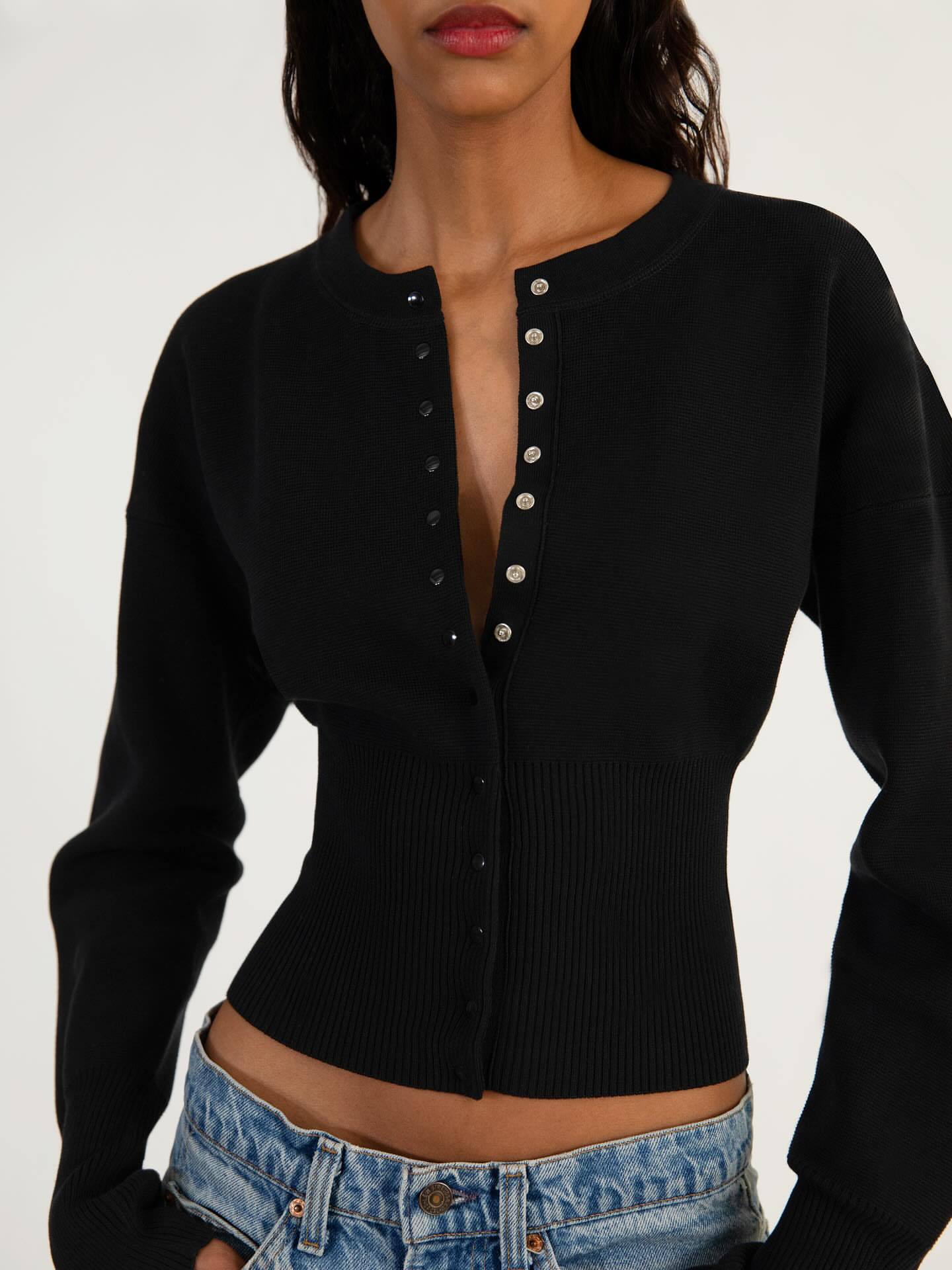 Women’s black ribbed knit cardigan sweater, round neck button placket
