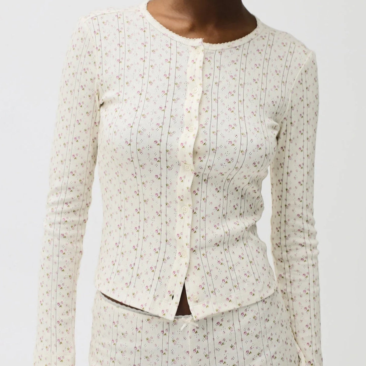 Ivory floral thin knit cardigan, round neck with scalloped edge, long sleeves, buttons