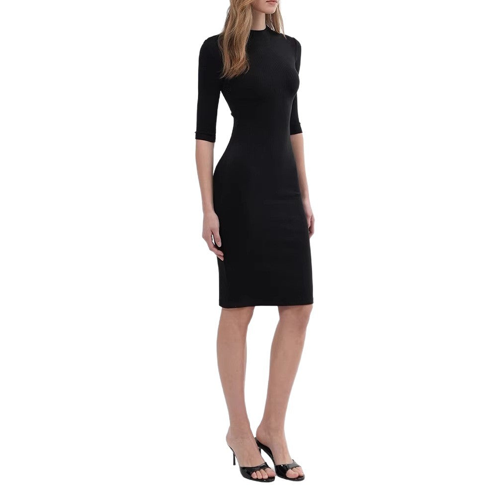 Black mock neck bodycon ribbed knit dress with three-quarter sleeves, midi length