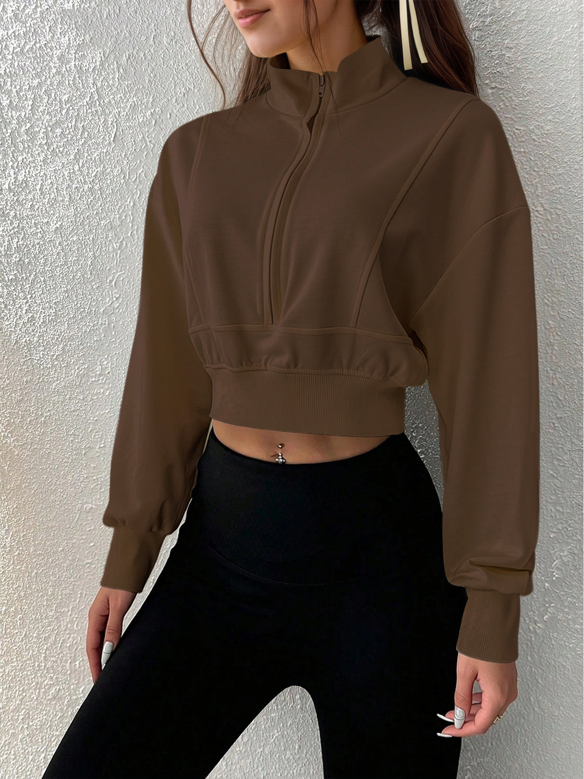 Dark brown cropped zip-up sweatshirt with stand collar and relaxed fit, front view