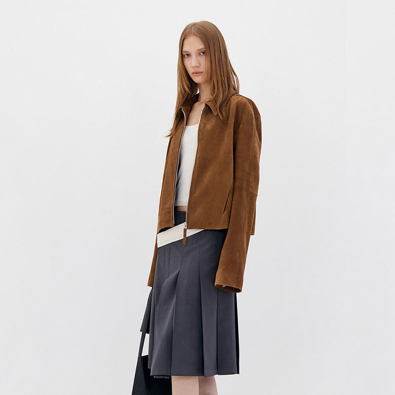 Brown suede jacket shown at an angle, with a short hem and front zipper.
