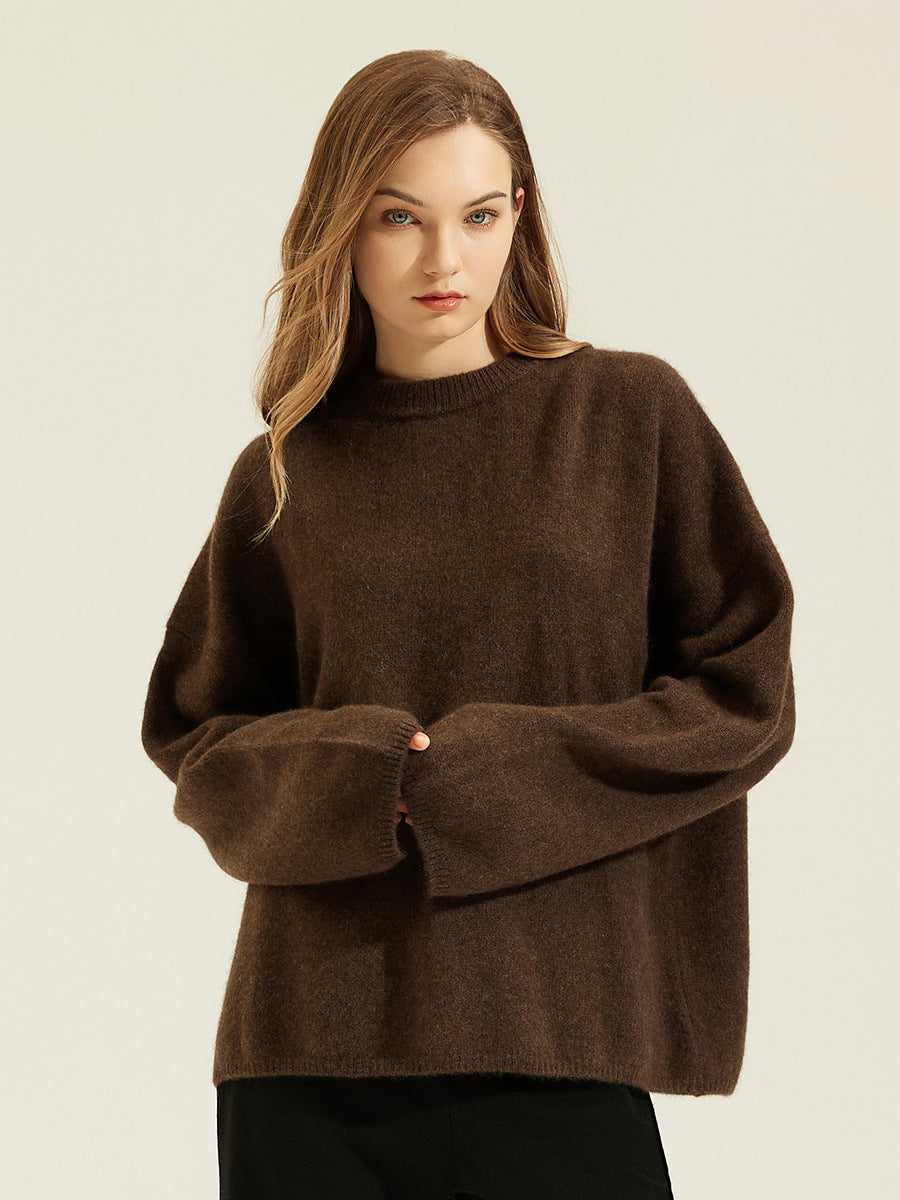 Brown women's loose knit pullover sweater with ribbed crew neck, cuffs, and hem