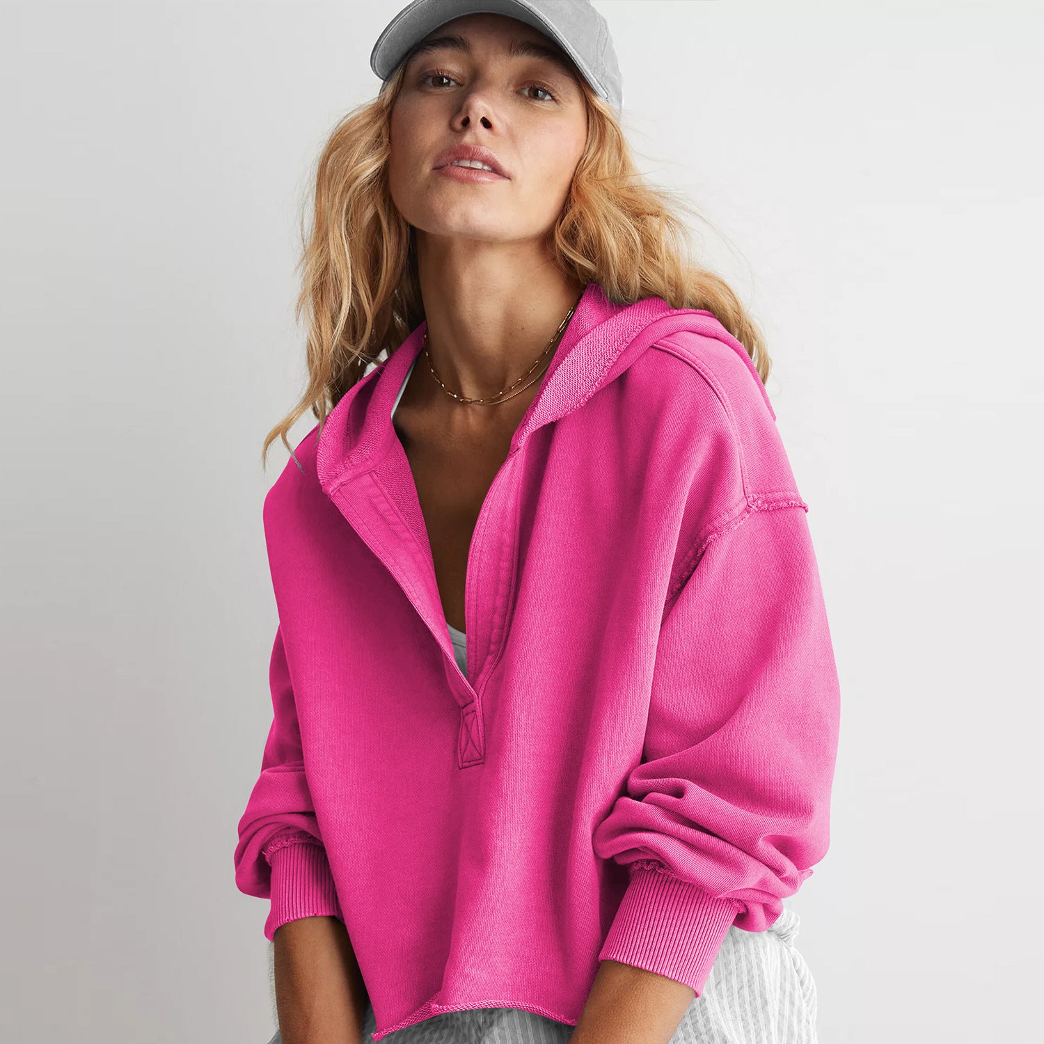 Women's bright pink V-neck hooded pullover sweatshirt, long sleeves