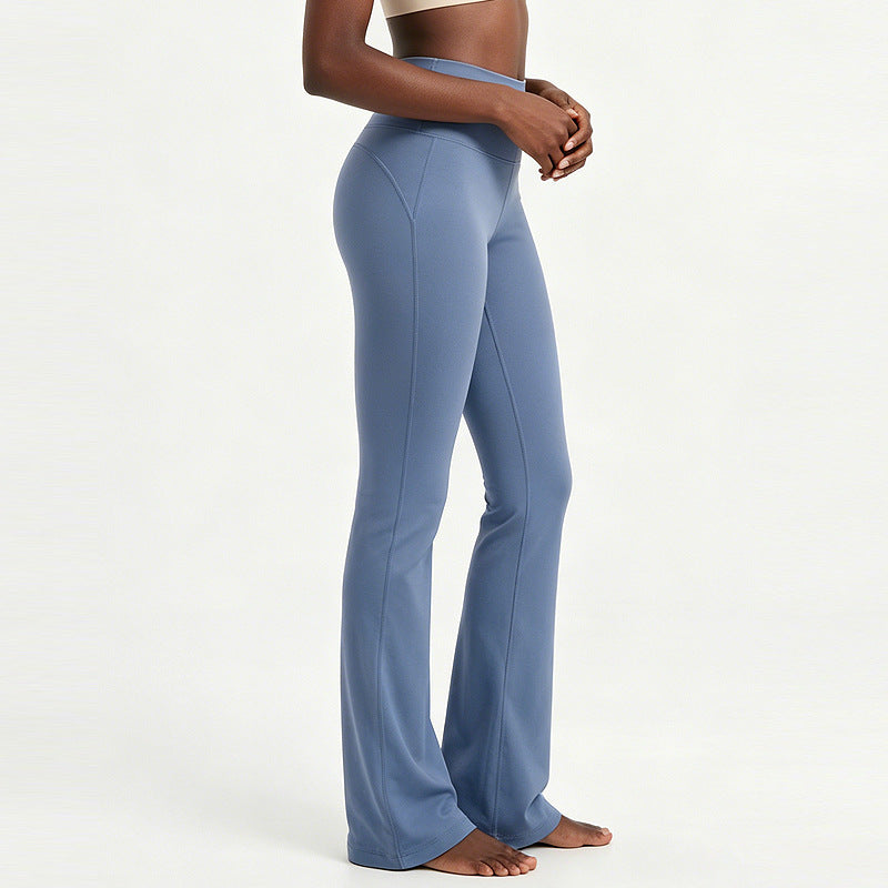 High-waisted flare yoga pants in periwinkle blue, front seam detail and wide legs