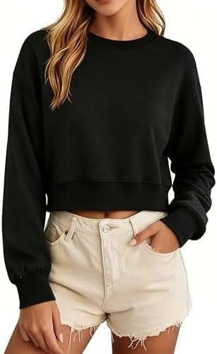 Black cropped sweatshirt with a crew neck, loose long sleeves, and ribbed cuffs