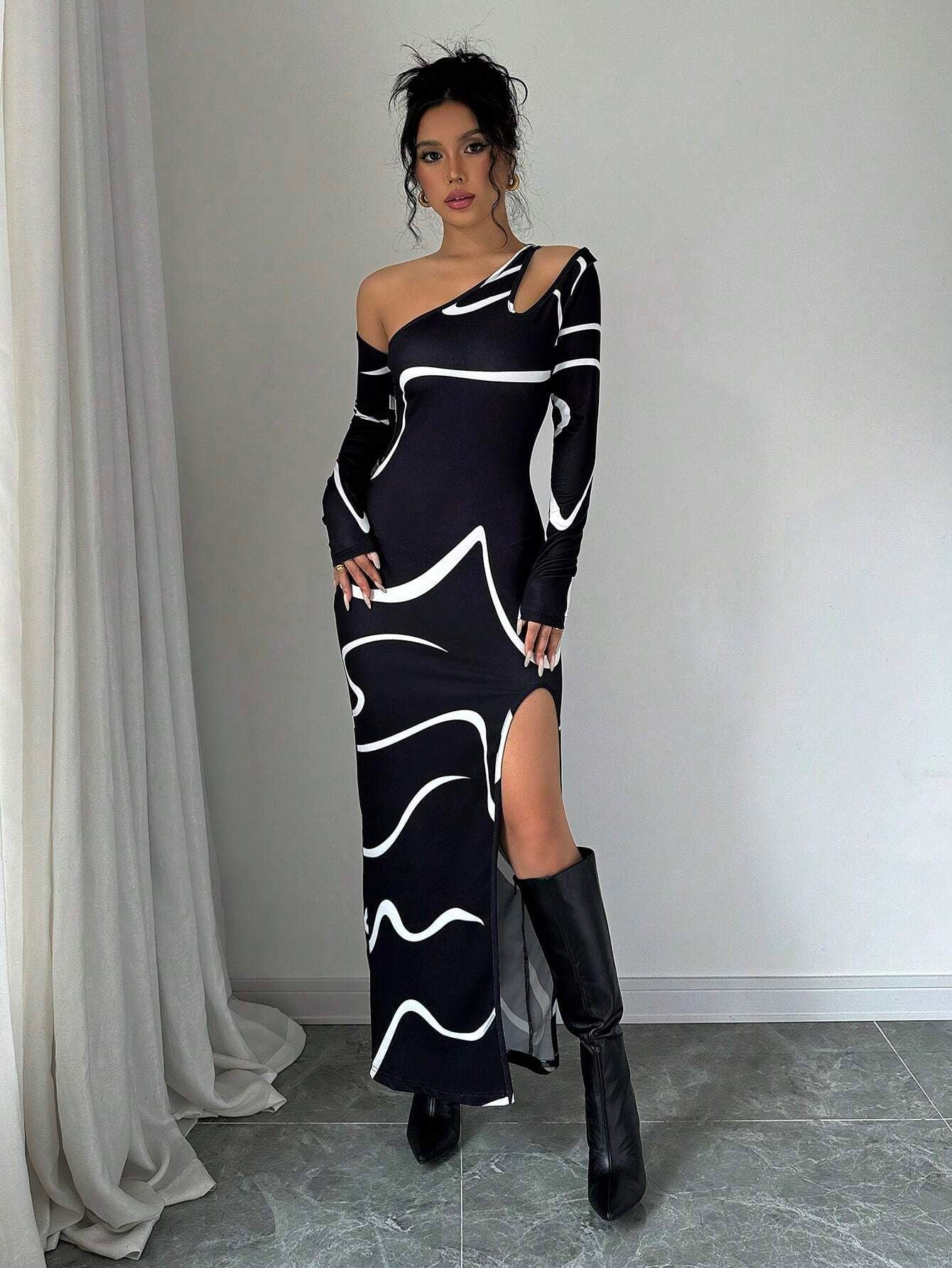 Black off-shoulder maxi dress with abstract wave print and long sleeves, high slit