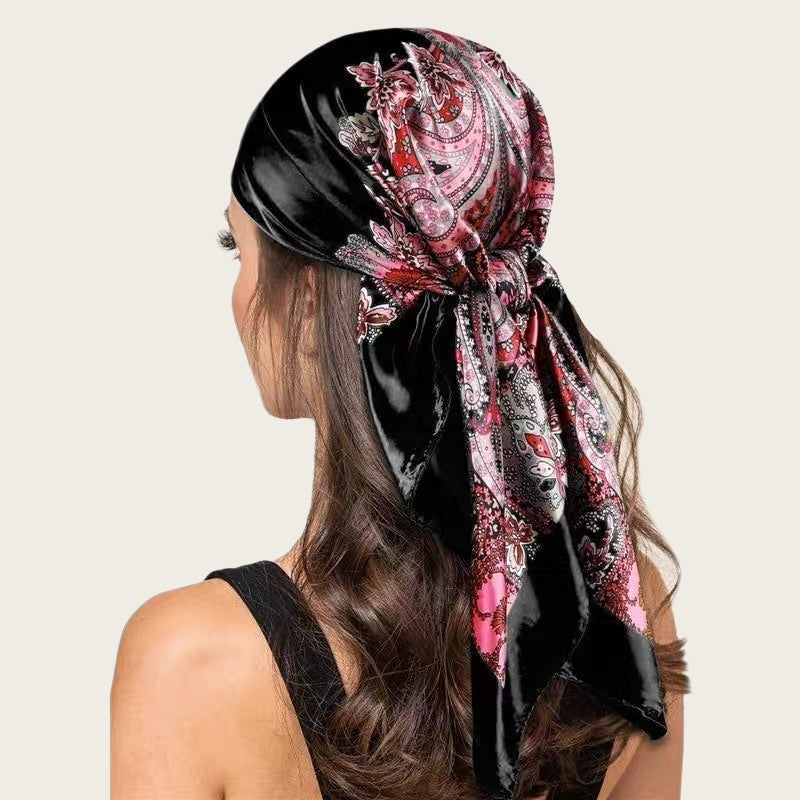Satin square scarf for head in black with pink, silver, and floral paisley print