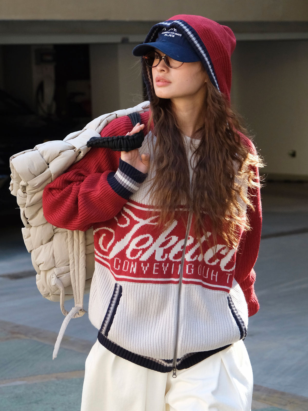 Women’s hooded sweater, red and white with navy letter graphic and striped cuffs