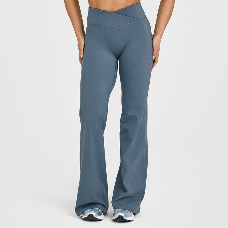 Women’s flared yoga pants in slate blue with smooth seams and wide bell bottoms