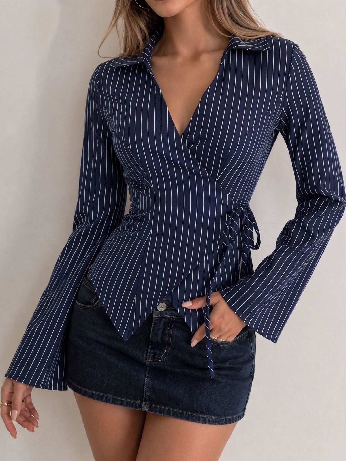 Navy striped long-sleeve collared blouse with drawstring waist and flared sleeves