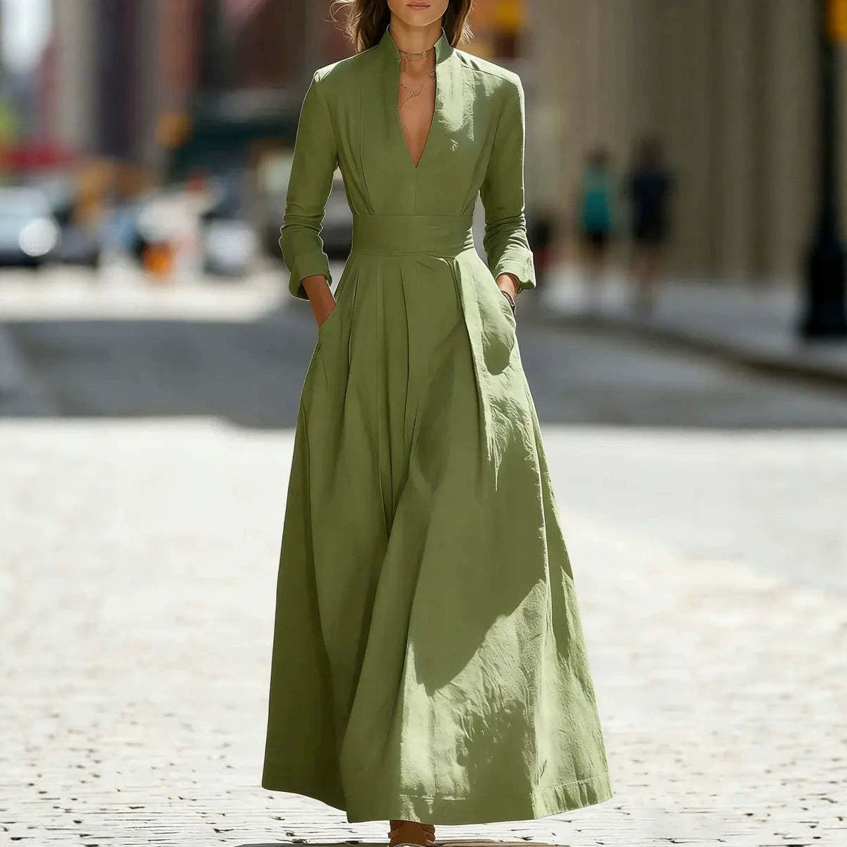 Green V-neck maxi dress with wide belt, long sleeves and full long skirt