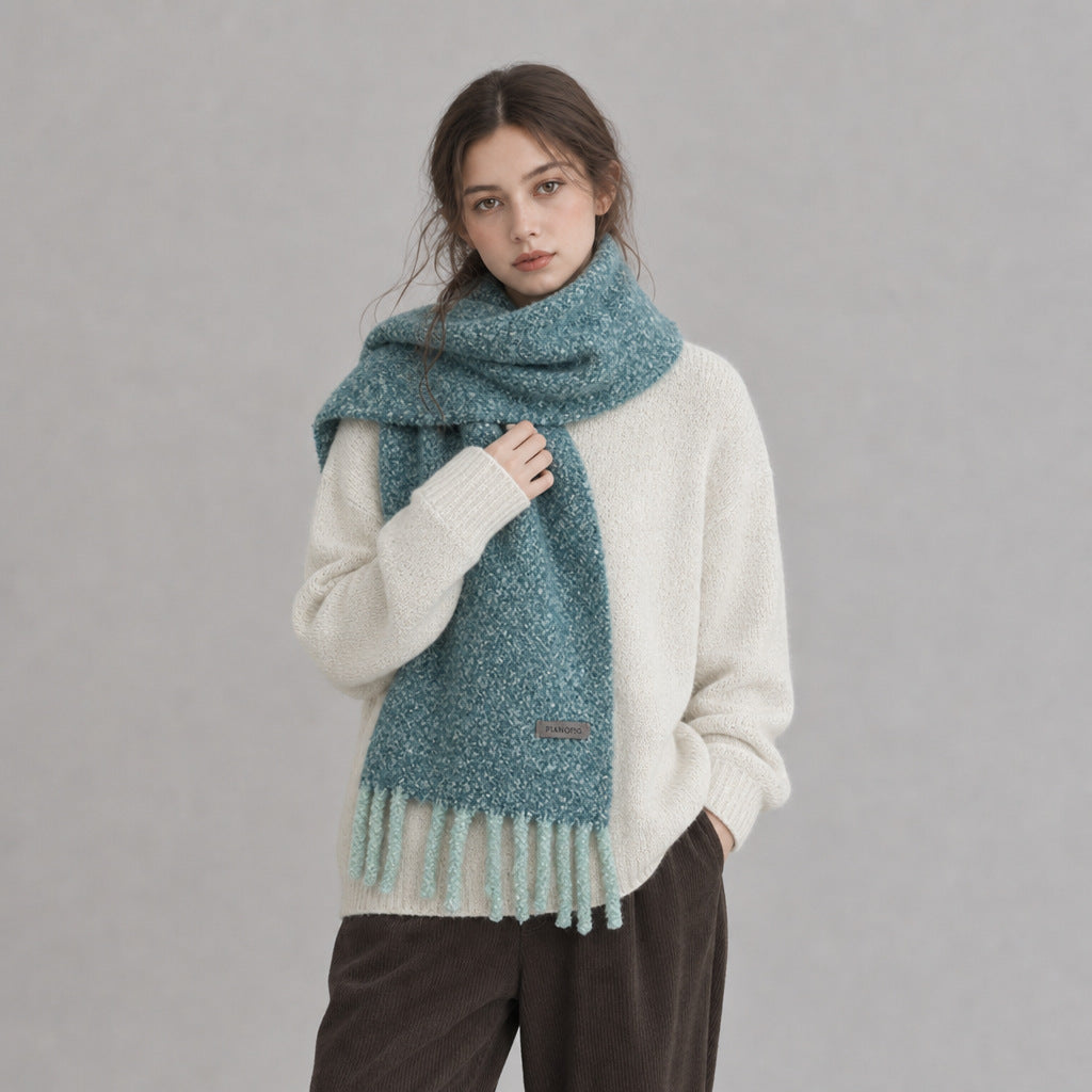 Chunky loop-knit scarf shawl in lake blue with fringe ends and stitched label detail