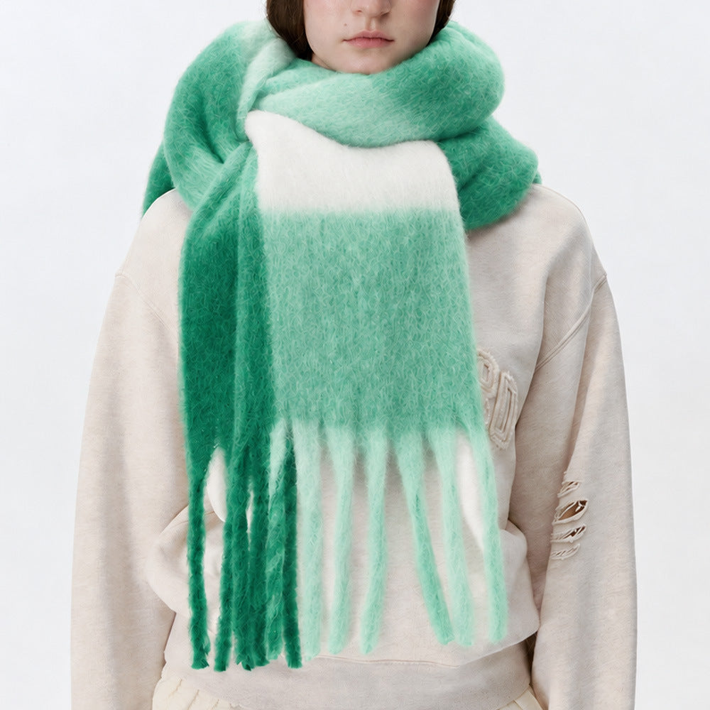 Women’s plaid scarf in green and white with fluffy texture and long fringe