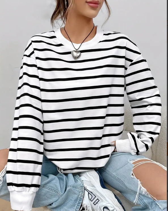 Women's striped sweatshirt front, white with black stripes, ribbed collar and long sleeves