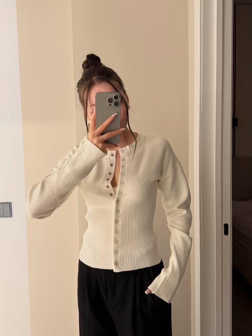 Women’s cream white ribbed knit cardigan with round neck and button front