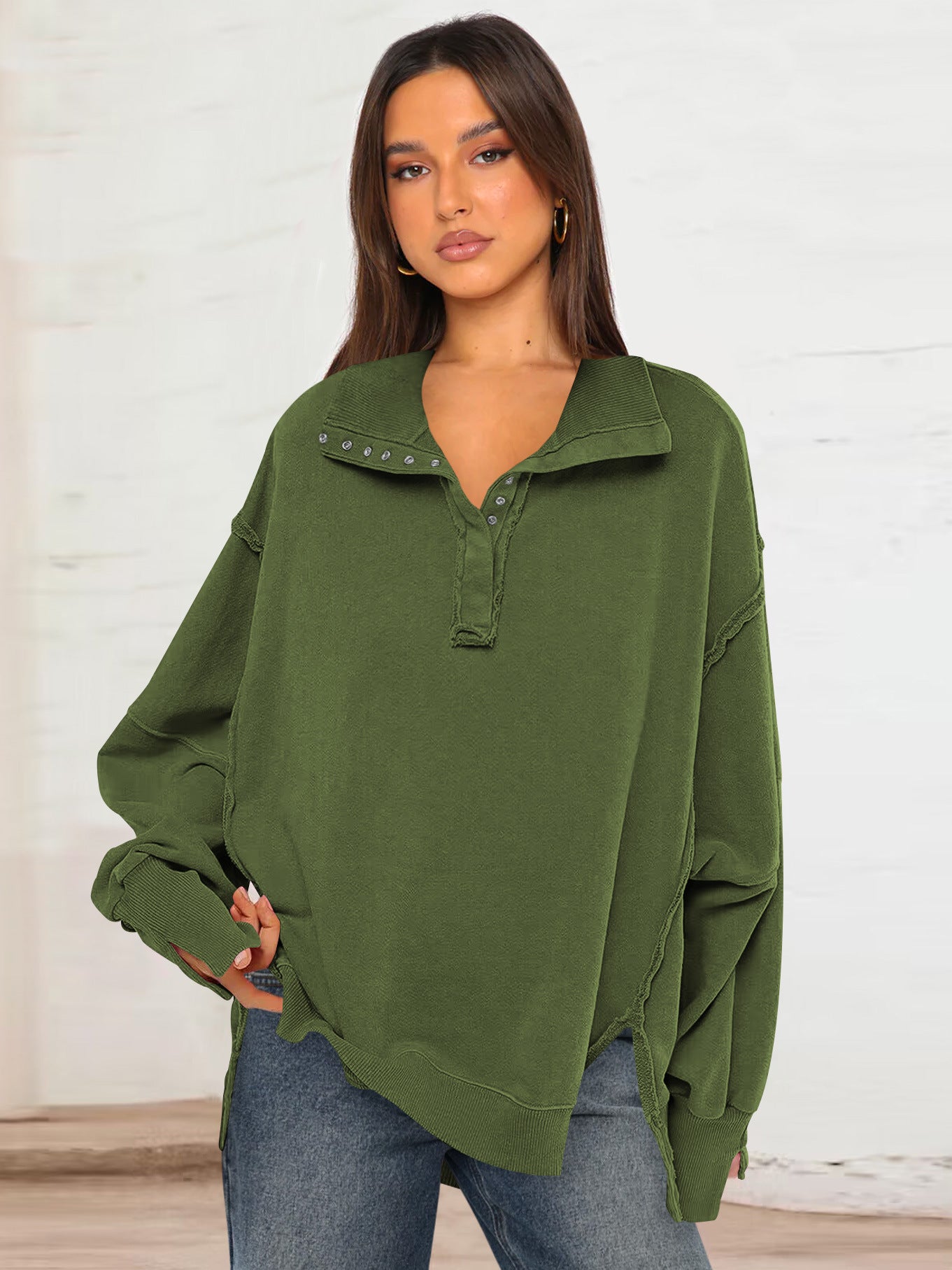 Women's deep green polo-collar sweatshirt top with button placket and lantern sleeves