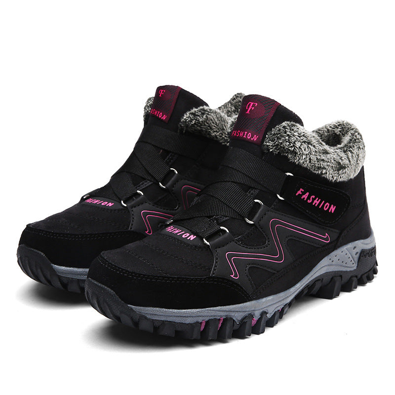 Black winter snow boots with faux fur collar, dual straps, and textured grippy sole