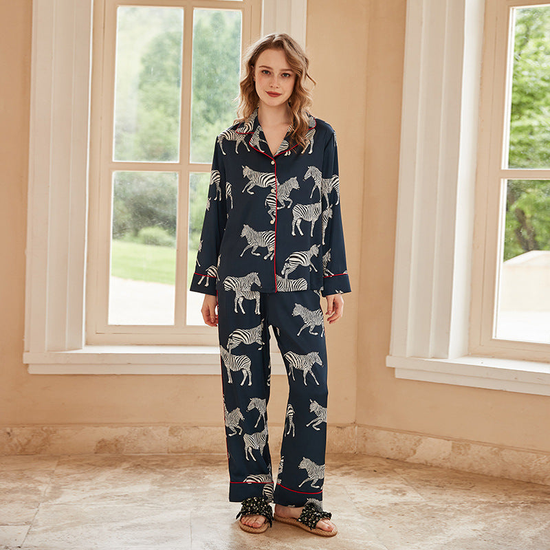 Front-view navy zebra print pajama set with button-front long-sleeve top and pants