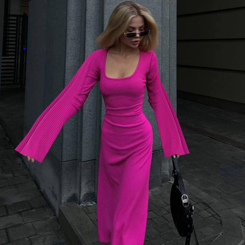 Ribbed knit maxi dress in hot pink, scoop neck, long bell sleeves, fitted column